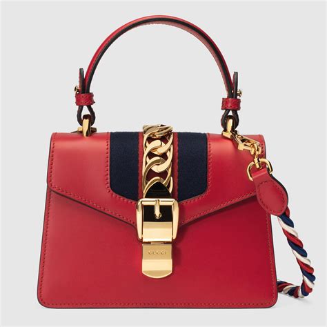 gucci sylvie mini red|Gucci mini sylvie bag.